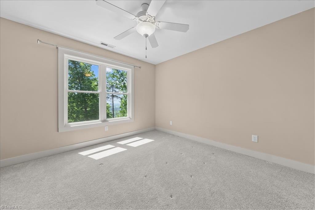 848 Sierra Trace Road Denton, NC 27239 - Photo 35 of 47 Bright and spacious secondary bedroom with ample room for guests or family.