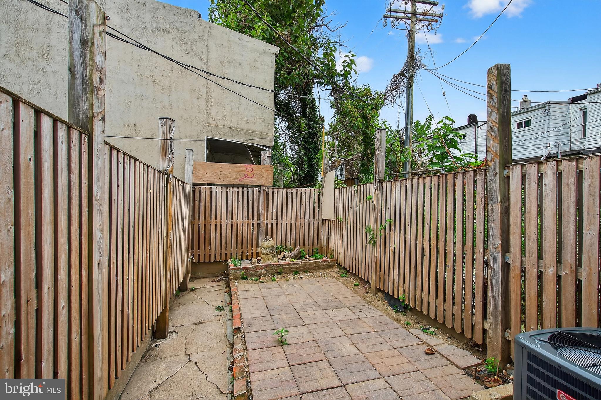 2202 Ashton Street Baltimore, MD 21223 - Photo 29 of 35 a view of a wrought iron gate