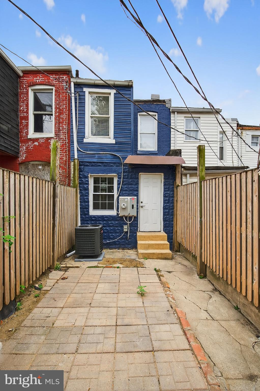 2202 Ashton Street Baltimore, MD 21223 - Photo 30 of 35 a view of a brick house with many windows