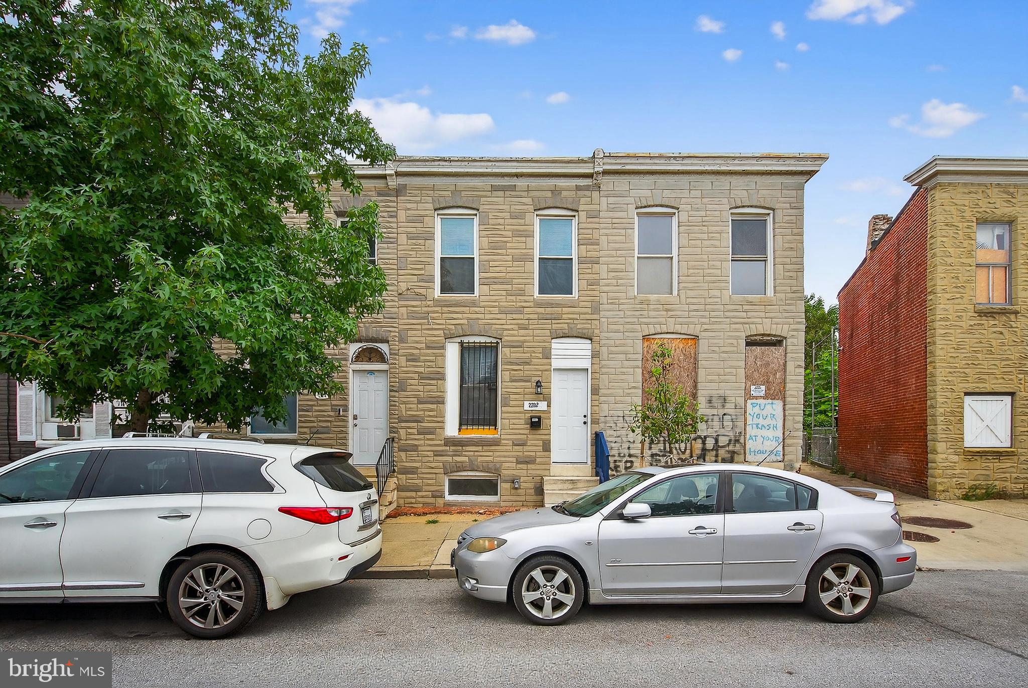 2202 Ashton Street Baltimore, MD 21223 - Photo 3 of 35 a view of a car parked in front of a house
