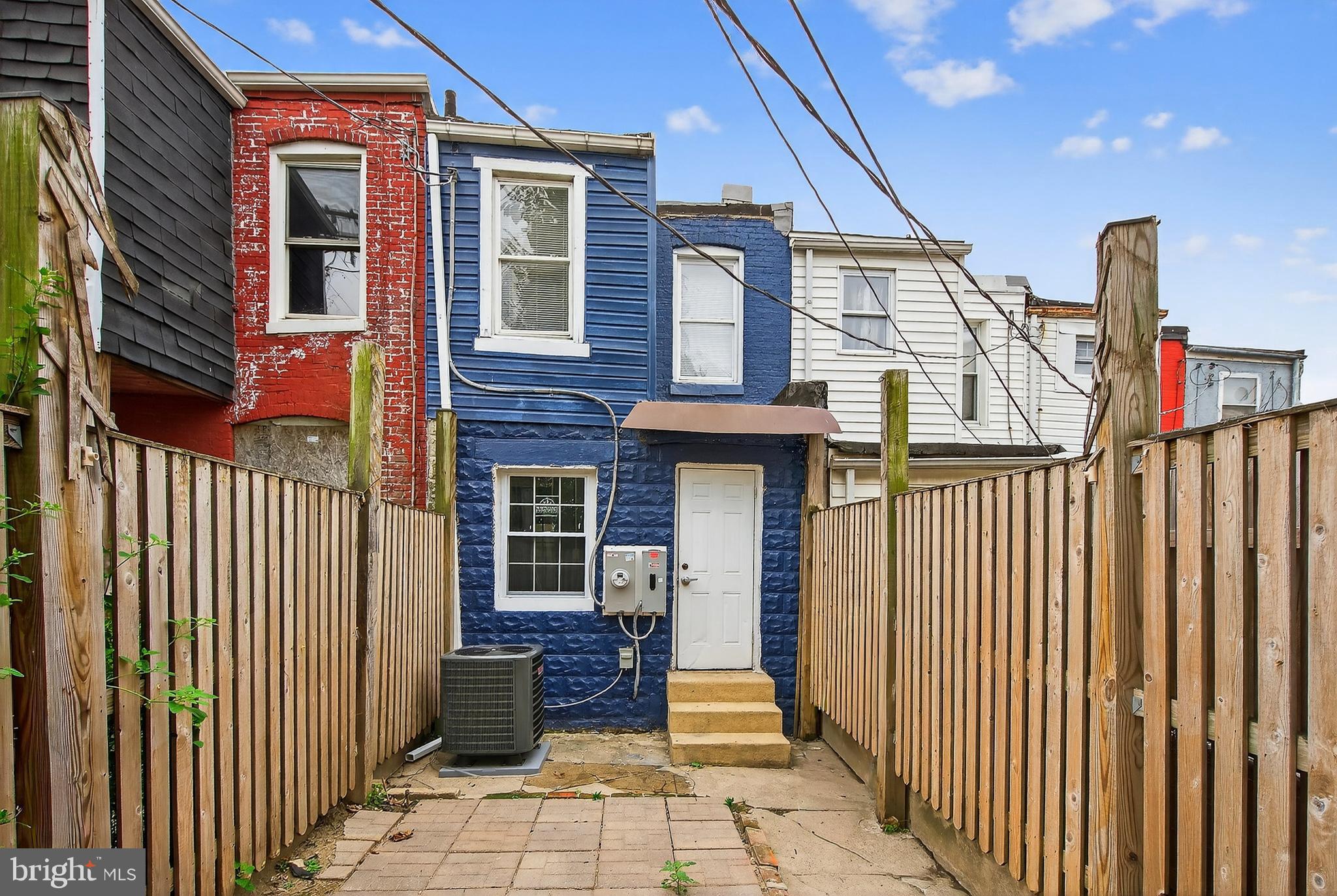 2202 Ashton Street Baltimore, MD 21223 - Photo 31 of 35 a view of a house with iron stairs