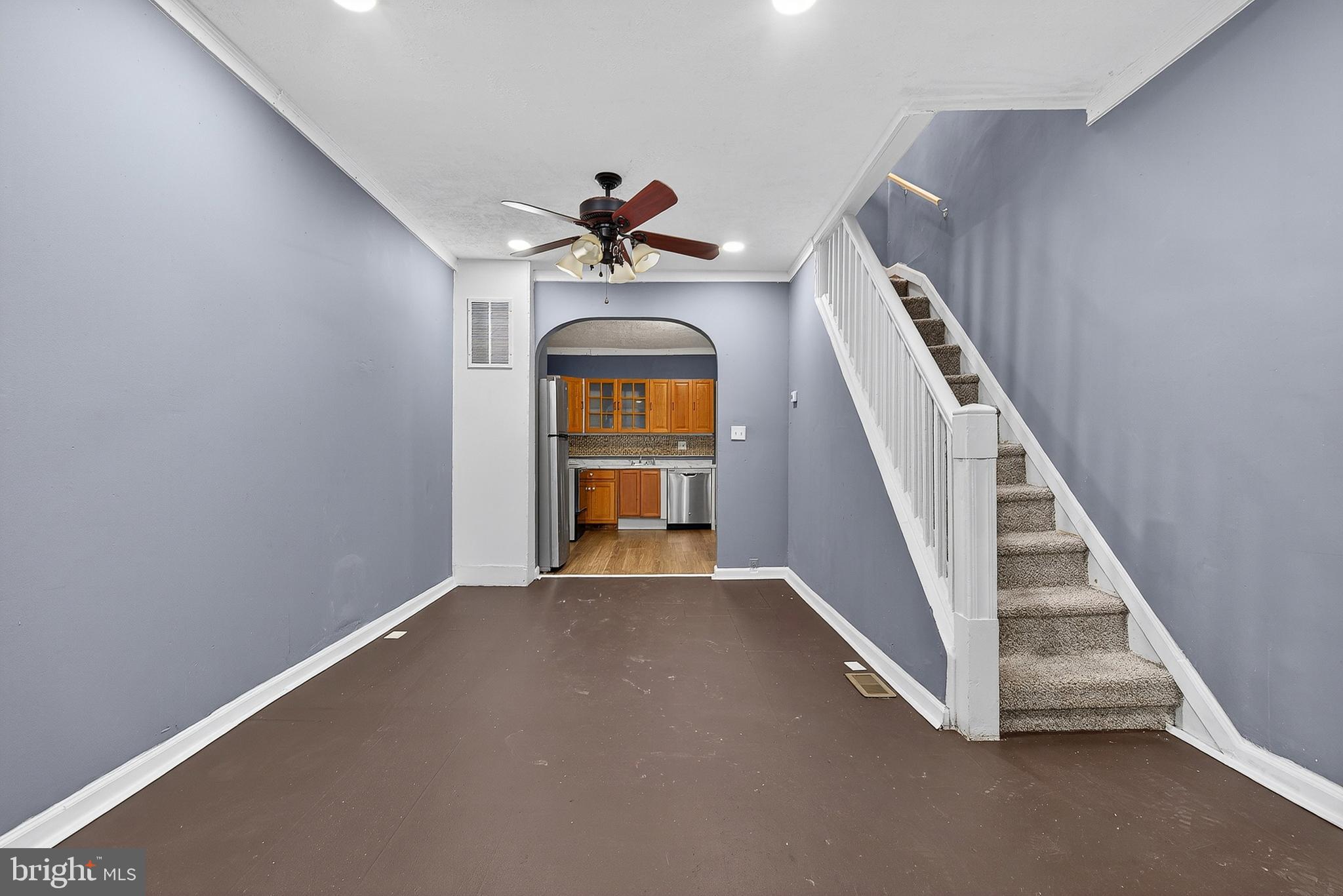 2202 Ashton Street Baltimore, MD 21223 - Photo 7 of 35 a view of a hallway with staircase
