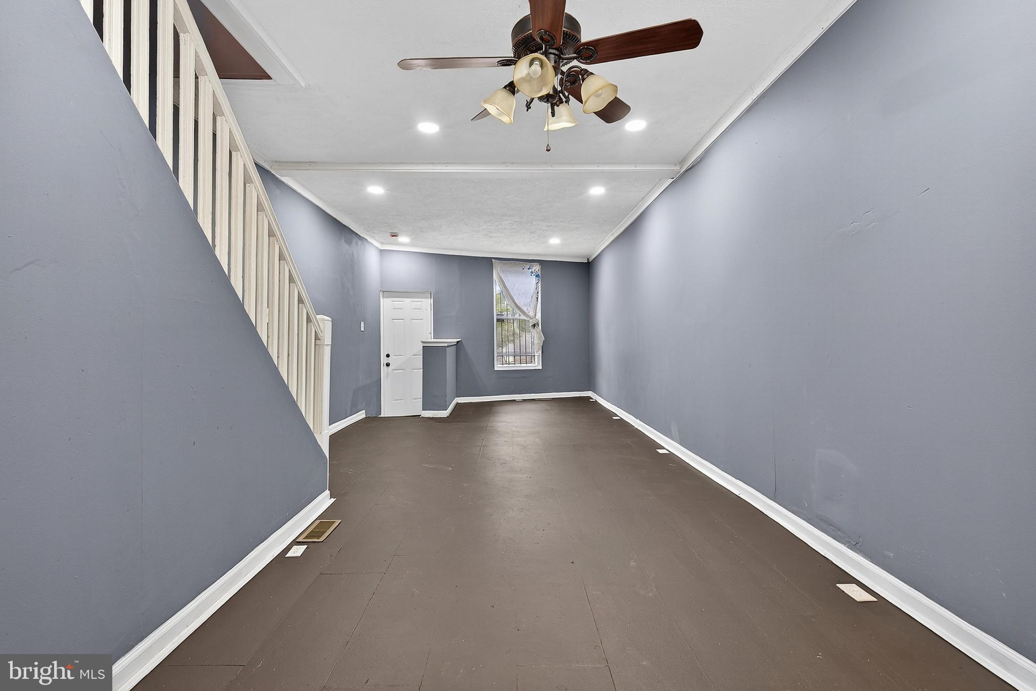 2202 Ashton Street Baltimore, MD 21223 - Photo 8 of 35 a view of livingroom and hardwood floor