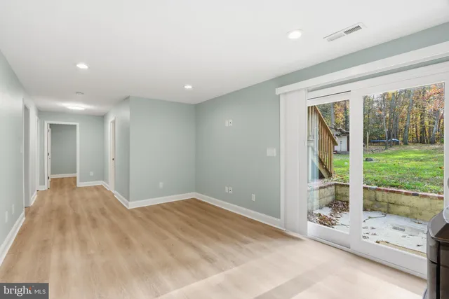 a view of livingroom with furniture and garden