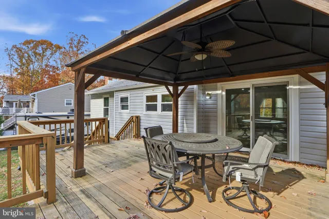 a patio with table and chairs