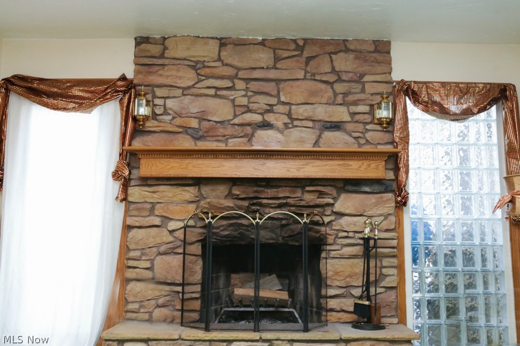 1668 Jacoby Road Akron, OH 44321 - Photo 15 of 22 Family room fireplace