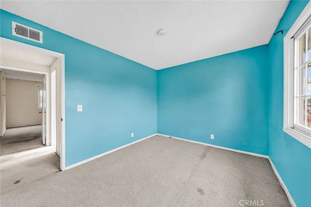 an empty room with a window