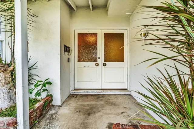 a view of a hallway view with staircase