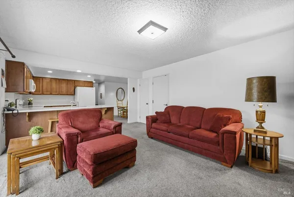 a bedroom with a bed and a table in it