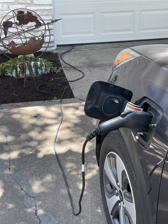9206 Robins Nest Lane Austin, TX 78729 - Photo 18 of 18 a utility room with dryer and washer