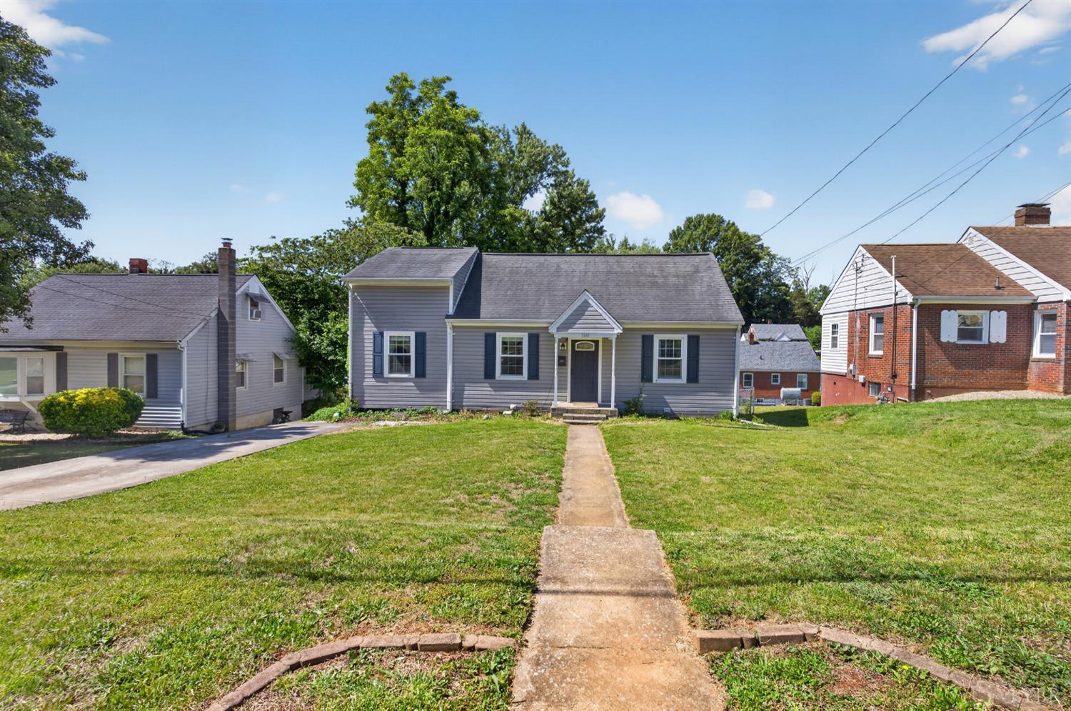 1305 Harding Street Lynchburg, VA 24502 - Photo 2 of 33 a front view of a house with a yard