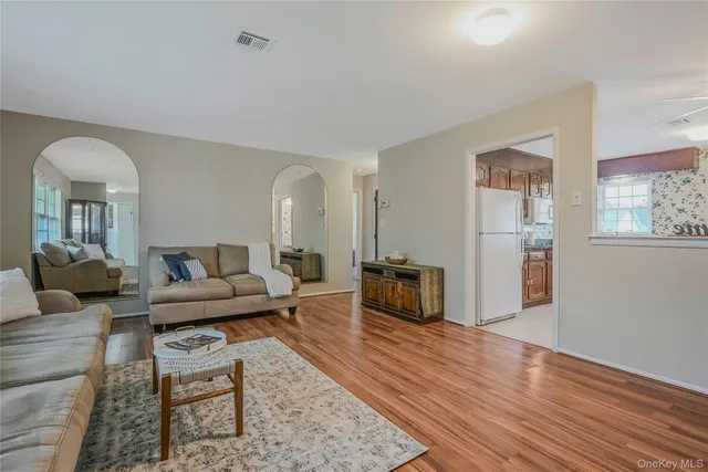 a living room with furniture and a couch