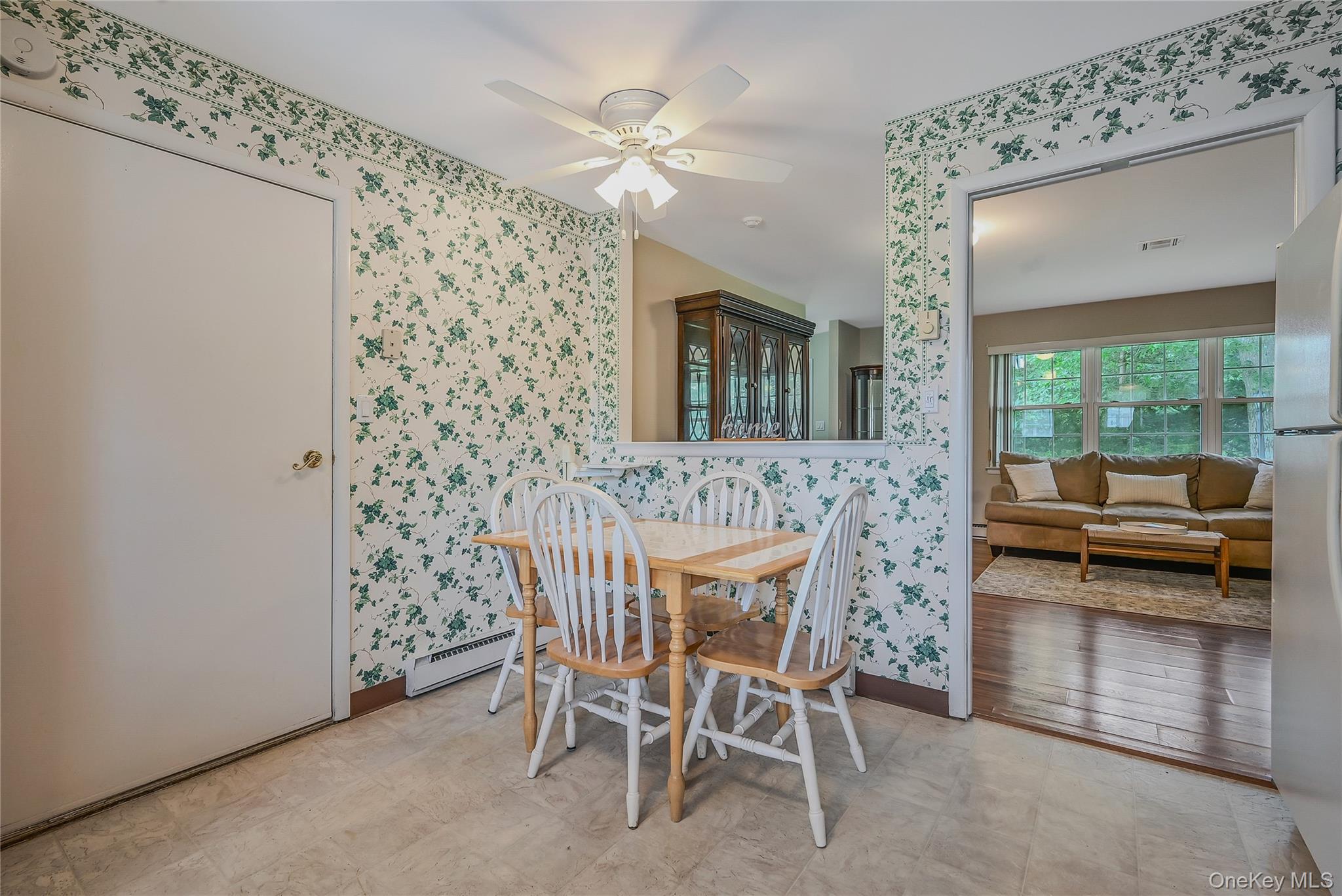 310 C Woodbridge Drive Ridge, NY 11961 - Photo 9 of 24 a dining room with furniture and window