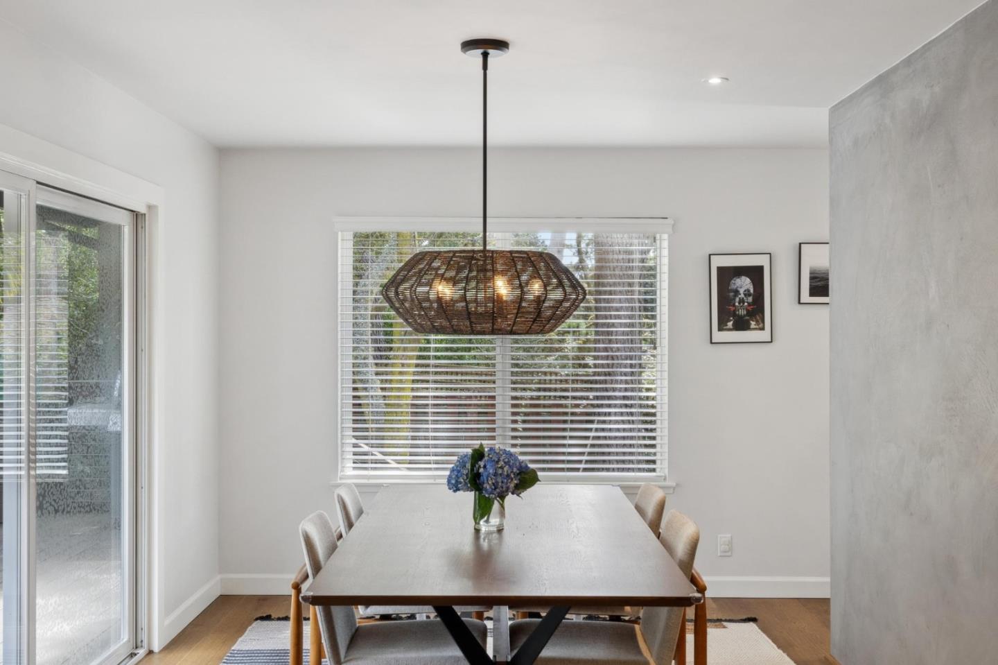 4095 Sunset Lane Pebble Beach, CA 93953 - Photo 18 of 55 a view of a dining room with furniture and wooden floor