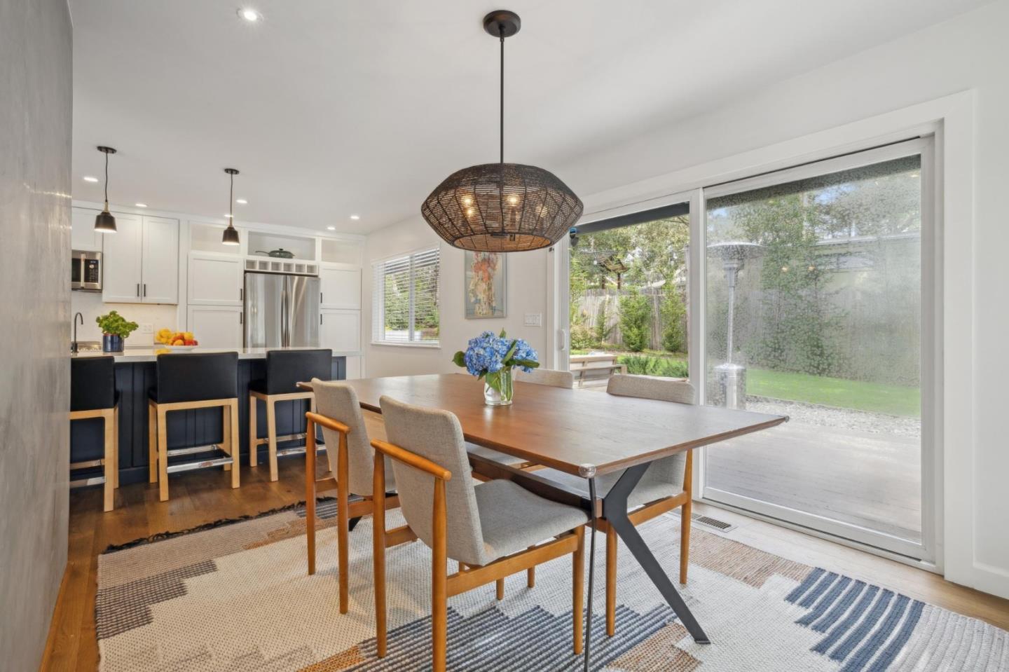 4095 Sunset Lane Pebble Beach, CA 93953 - Photo 19 of 55 a view of a dining room with furniture window and outside view