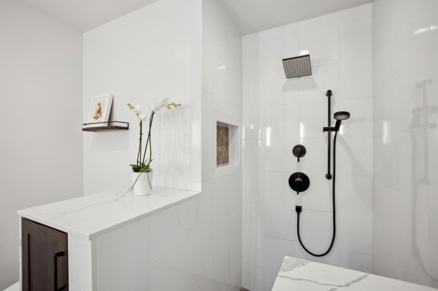 4095 Sunset Lane Pebble Beach, CA 93953 - Photo 25 of 55 a bathroom with a shower