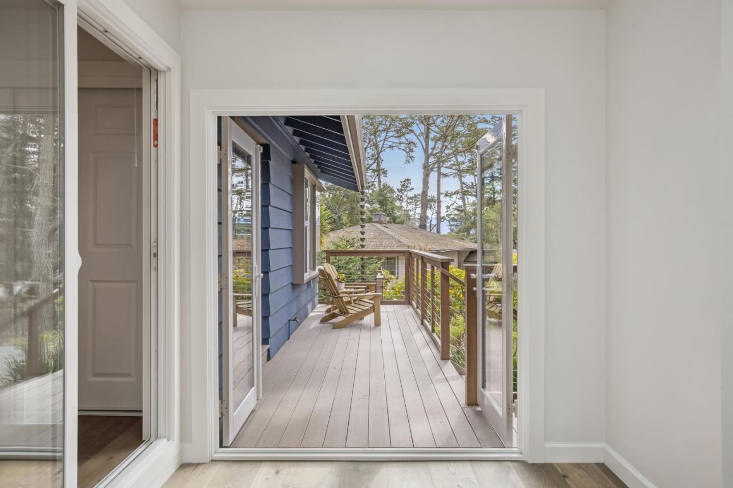 4095 Sunset Lane Pebble Beach, CA 93953 - Photo 39 of 55 a view of a porch with furniture and floor to ceiling window