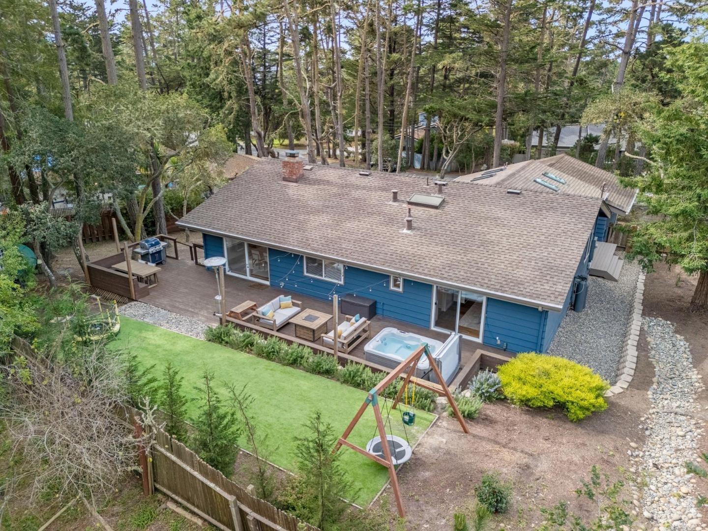 4095 Sunset Lane Pebble Beach, CA 93953 - Photo 43 of 55 an aerial view of a house with swimming pool and patio
