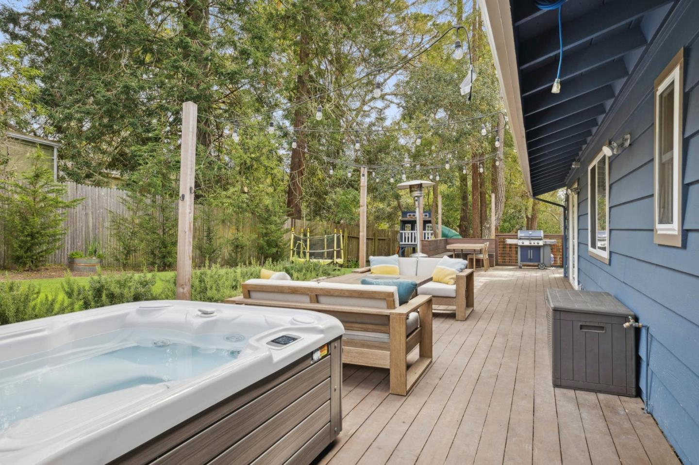 4095 Sunset Lane Pebble Beach, CA 93953 - Photo 48 of 55 a backyard of a house with table and chairs