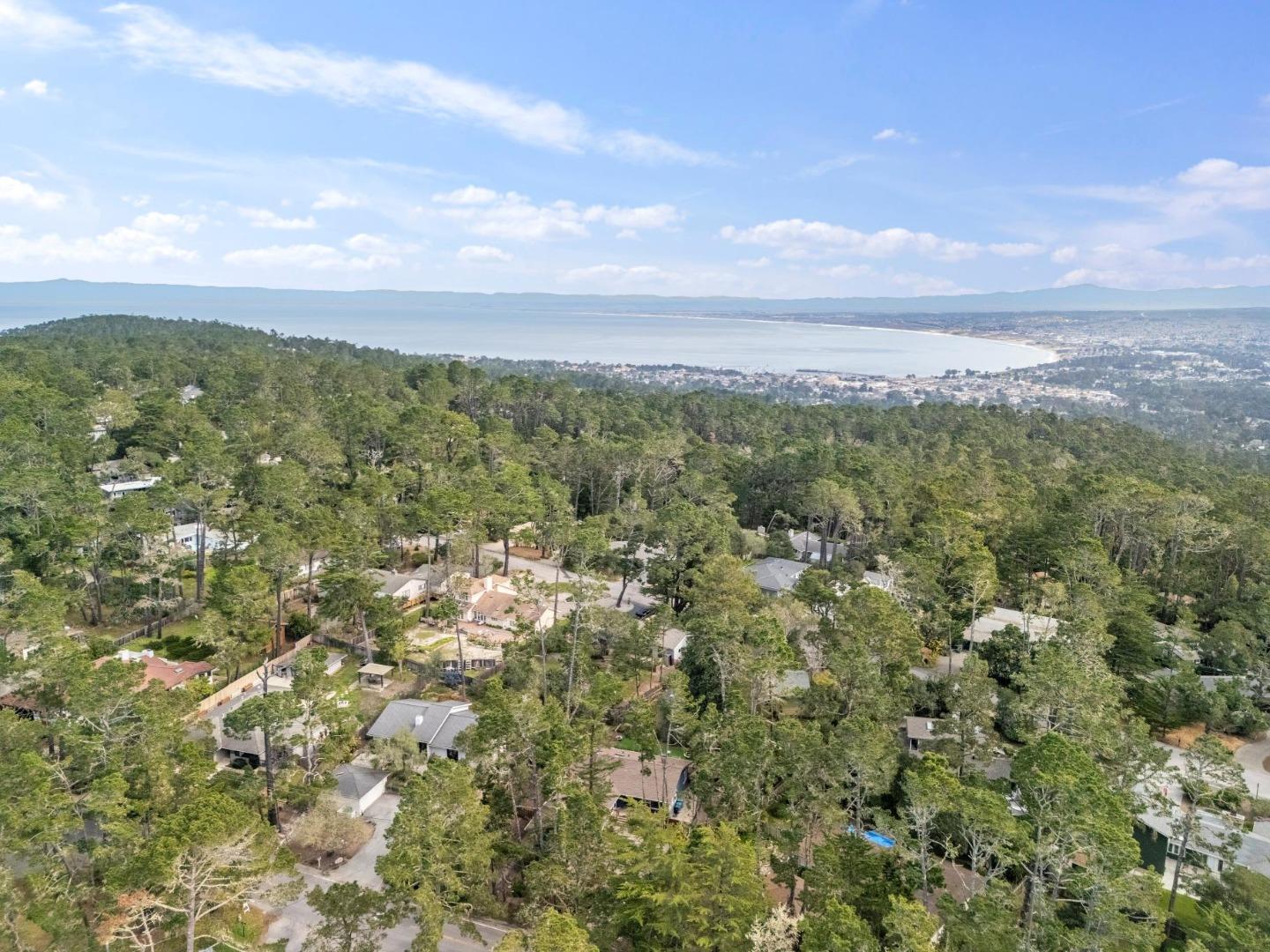 4095 Sunset Lane Pebble Beach, CA 93953 - Photo 52 of 55 a view of a city with lush green forest