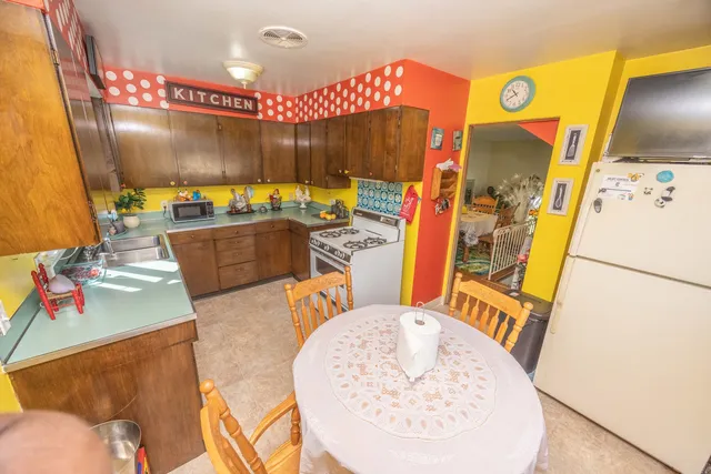 a view of a living room and a kitchen
