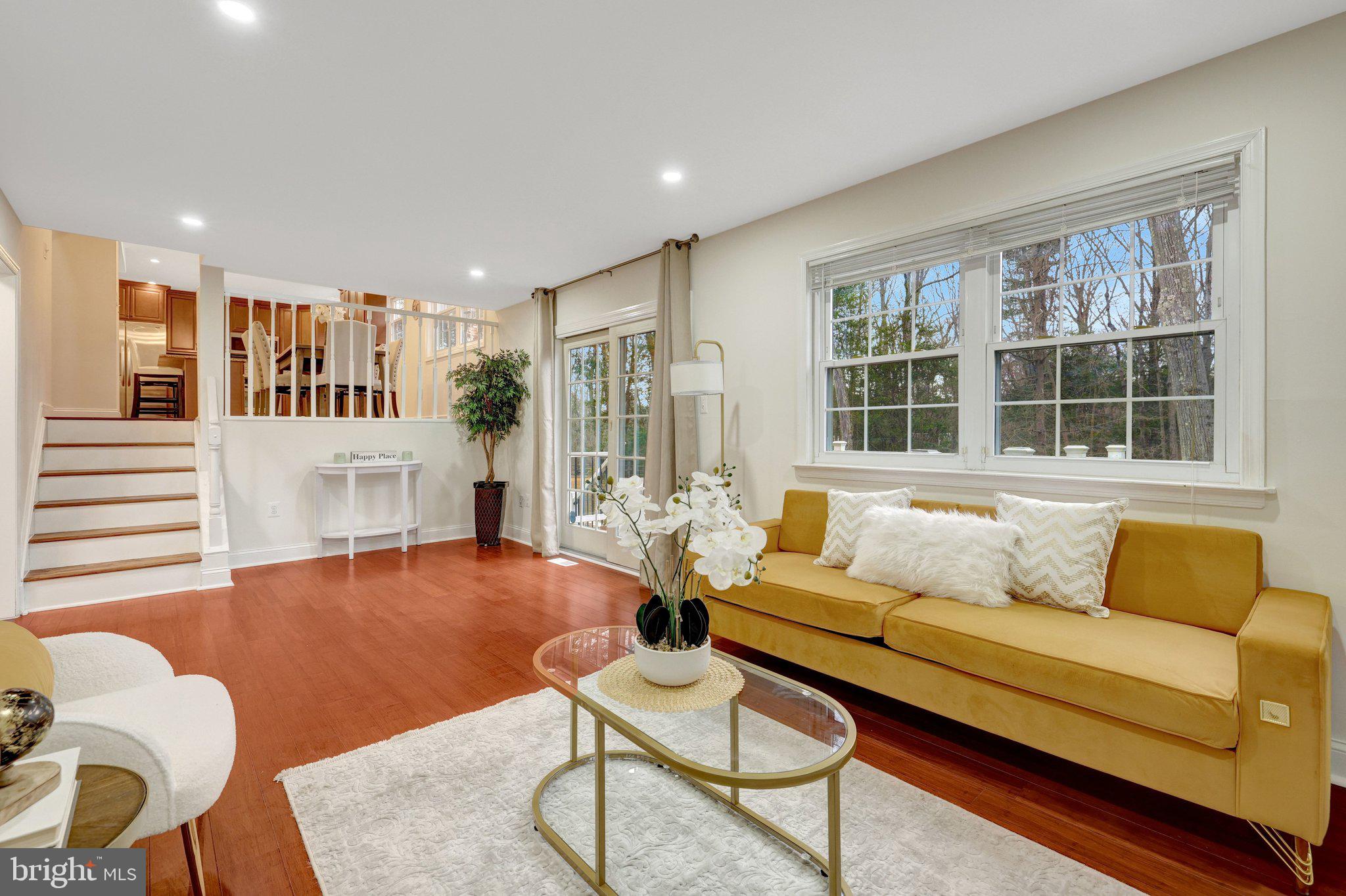 1827 Post Oak Trail Reston, VA 20191 - Photo 15 of 33 a living room with furniture and a fireplace