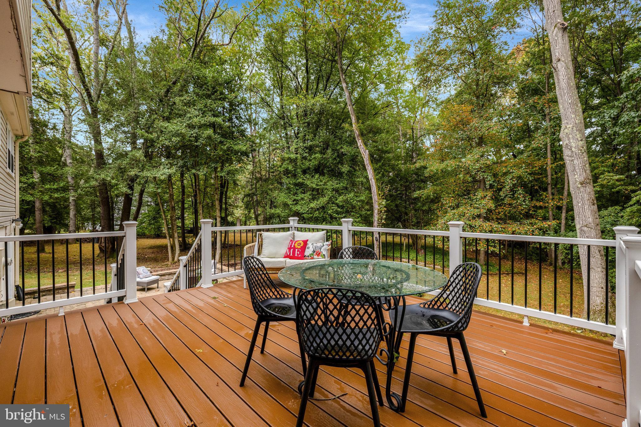 1827 Post Oak Trail Reston, VA 20191 - Photo 18 of 33 a view of deck with furniture and wooden floor
