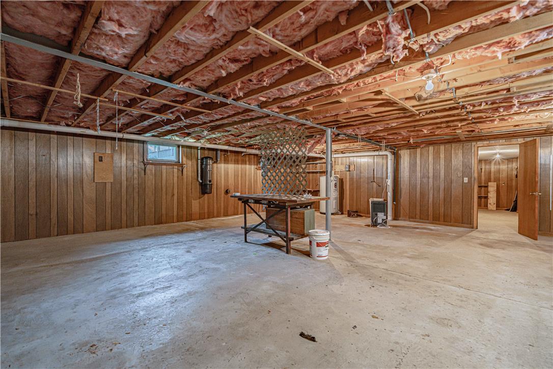 4815 Mill Road Schnecksville, PA 18078 - Photo 37 of 48 A spacious, unfinished basement offers ample potential for future customization and utility.