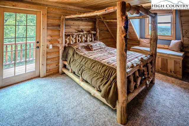 a view of a livingroom with furniture and windows