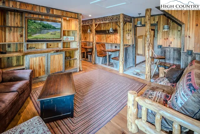 a view of a entryway with wooden floor and stairs