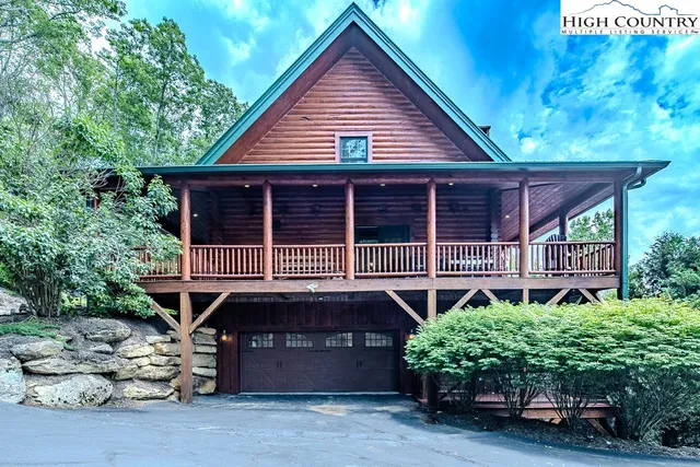 a view of a balcony with wooden floor