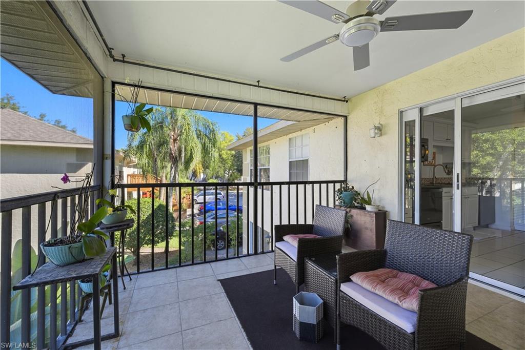 5356 16th Place Southwest, Unit G4 Naples, FL 34116 - Photo 21 of 23 a view of a porch with furniture