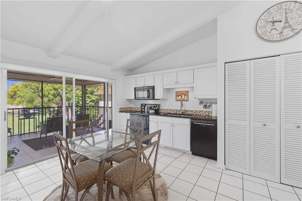 5356 16th Place Southwest, Unit G4 Naples, FL 34116 - Photo 8 of 23 a dining room with furniture and window