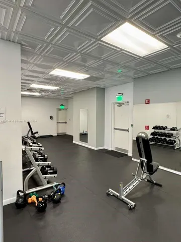 a view of a room with gym equipment