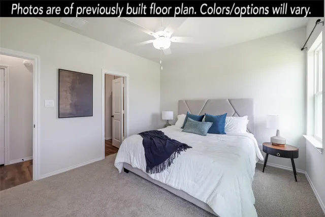 a en suite bathroom with a sink and mirror
