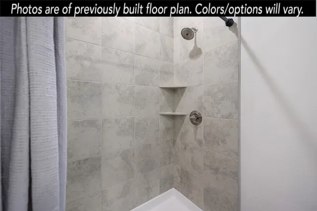 a bathroom with a toilet a sink and a mirror