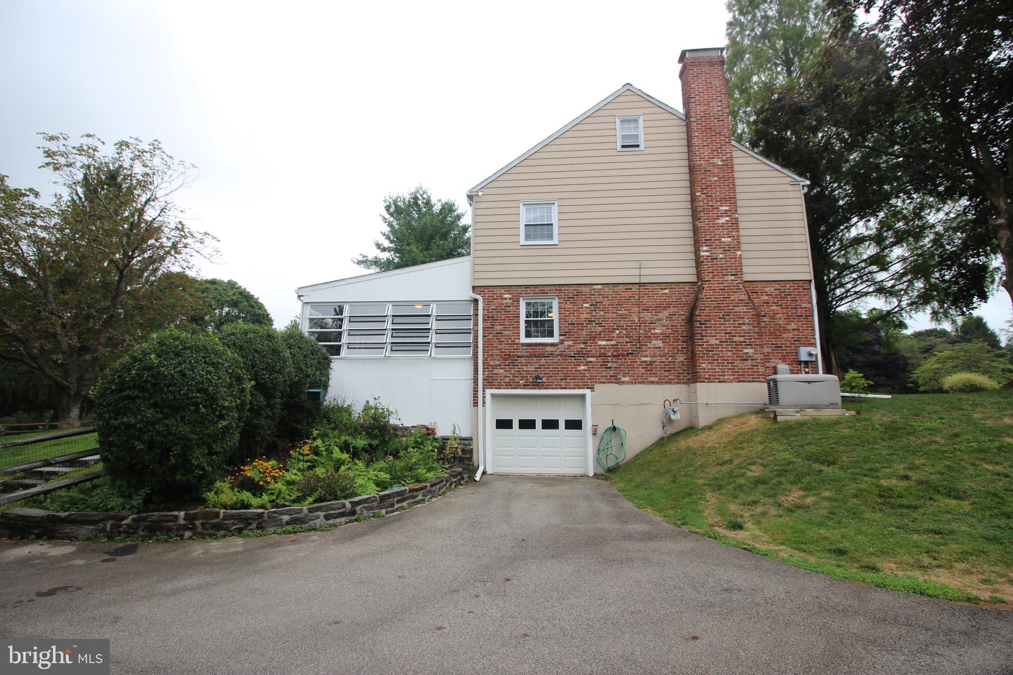 9 Pickwick Lane Malvern, PA 19355 - Photo 58 of 61 House Side View with 1 Car Garage