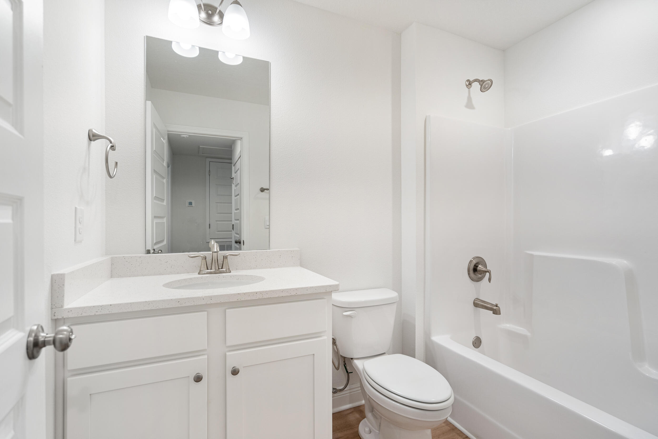 38 Redbird Loop Destin, FL 32541 - Photo 15 of 23 a bathroom with a sink a toilet and shower