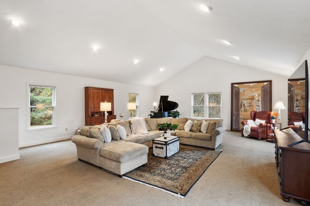 50 Hidden Road Andover, MA 01810 - Photo 15 of 42 a living room with furniture and a large window