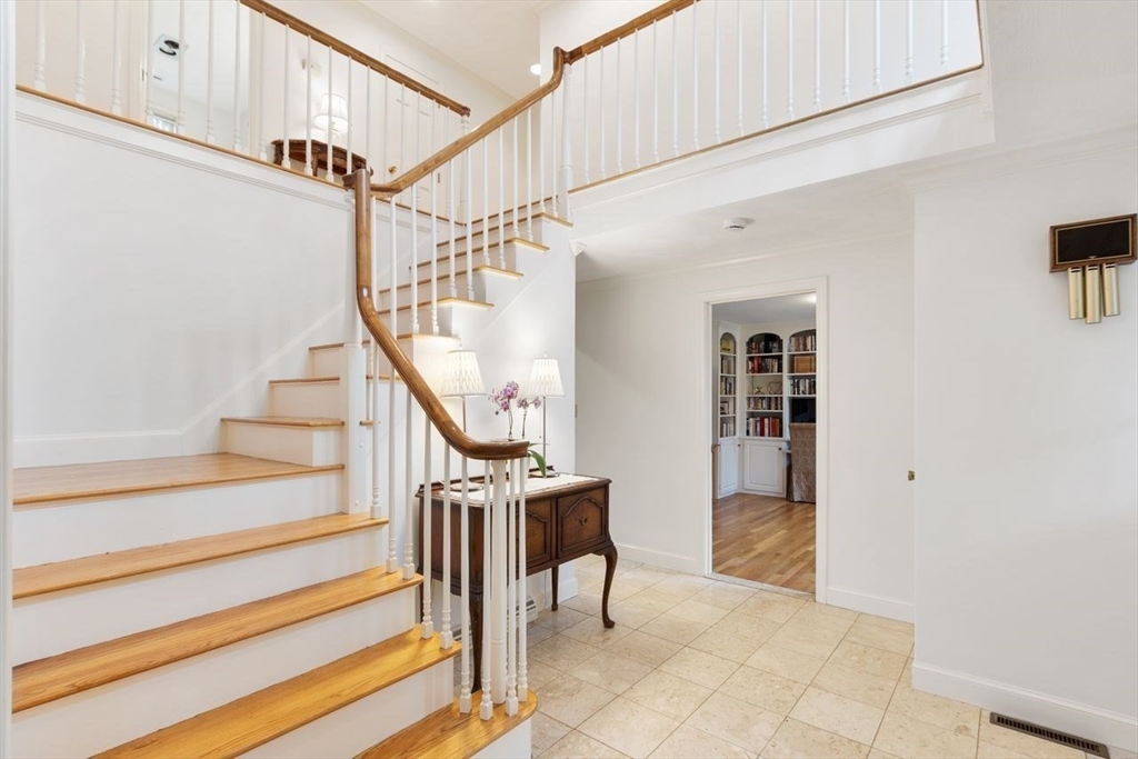50 Hidden Road Andover, MA 01810 - Photo 2 of 42 a view of entryway and hall with wooden floor