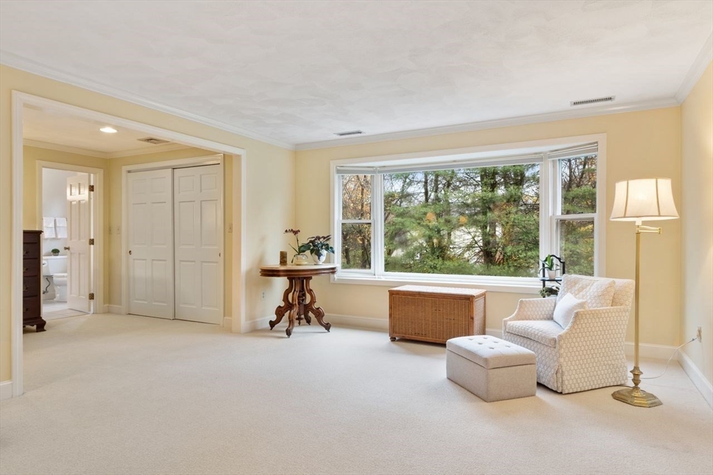50 Hidden Road Andover, MA 01810 - Photo 21 of 42 a living room with furniture and a large window