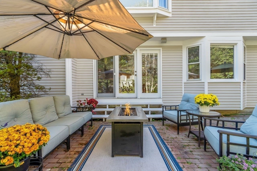 50 Hidden Road Andover, MA 01810 - Photo 32 of 42 a outdoor space with patio the couches and pool