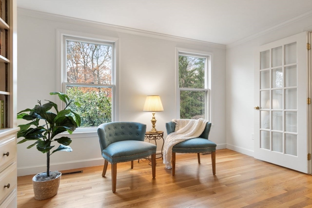 50 Hidden Road Andover, MA 01810 - Photo 6 of 42 a living room with furniture and a potted plant
