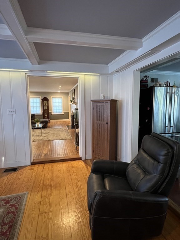 469 Eldridge Street Fall River, MA 02720 - Photo 12 of 40 a living room with furniture and a wooden floor