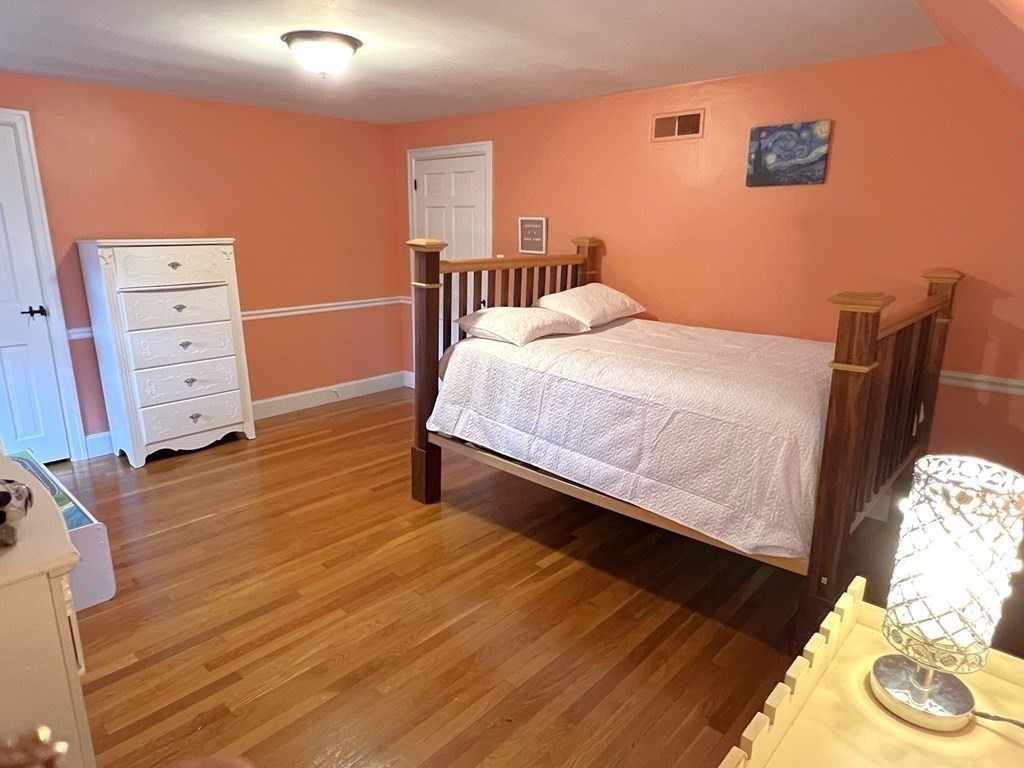 469 Eldridge Street Fall River, MA 02720 - Photo 20 of 40 a bedroom with a bed and a dresser