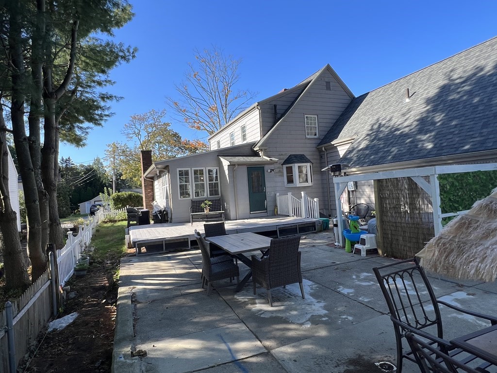 469 Eldridge Street Fall River, MA 02720 - Photo 32 of 40 a view of a house with backyard and sitting area