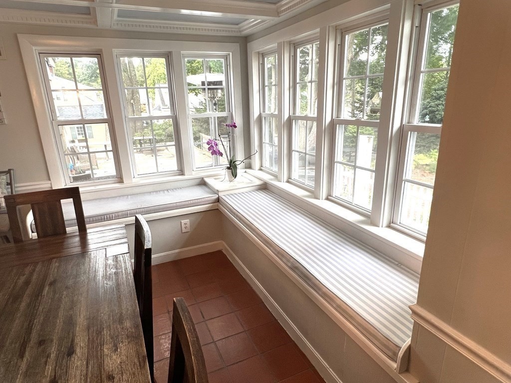 469 Eldridge Street Fall River, MA 02720 - Photo 6 of 40 a kitchen with a large window a sink and cabinets