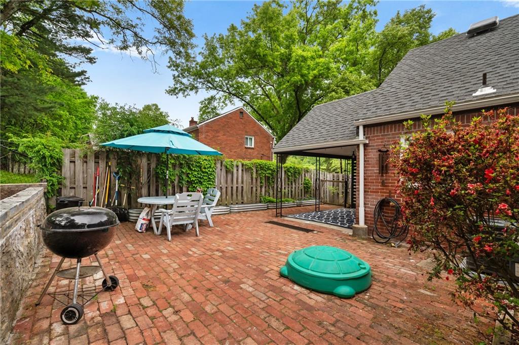 471 Filmore Road Pittsburgh, PA 15221 - Photo 29 of 30 The back brick side patio. The rear wall was restored in 2022