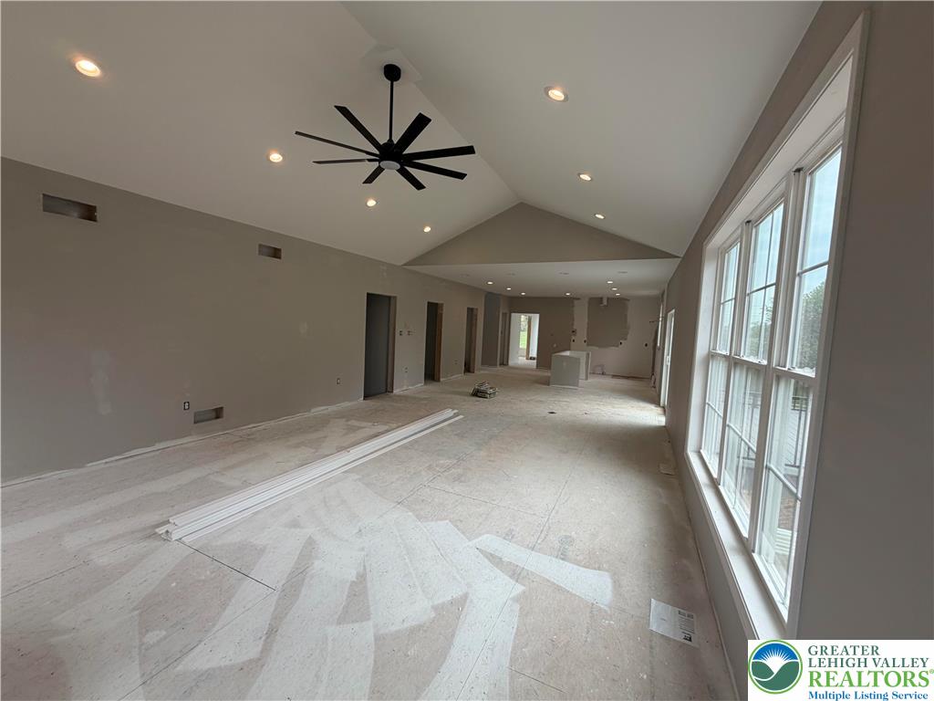 1899 Kecks Road Breinigsville, PA 18031 - Photo 30 of 30 This spacious interior offers an open floorplan with vaulted ceilings, ideal for modern living.