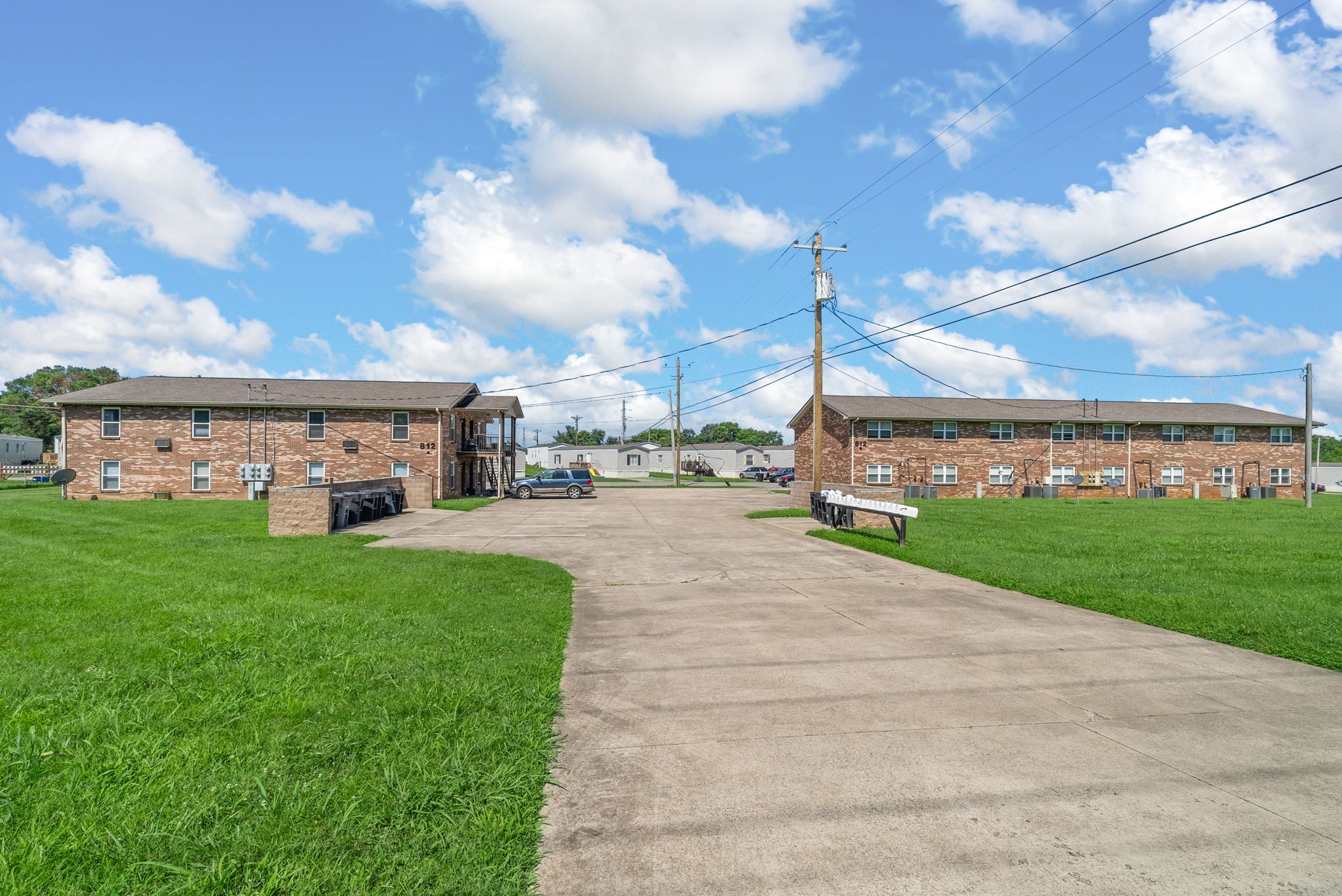 812 Pembroke Oak Grove Road, Unit 14 Oak Grove, KY 42262 - Photo 11 of 11 a view of a city with tall buildings and a big yard